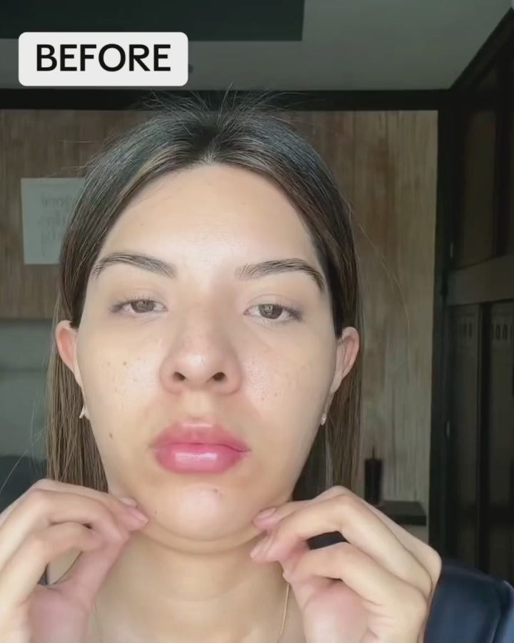 Woman using Nurse Jamie UpLift face roller on jawline showing 24 massaging stones and cooling benefits NJBD5362#color_purple